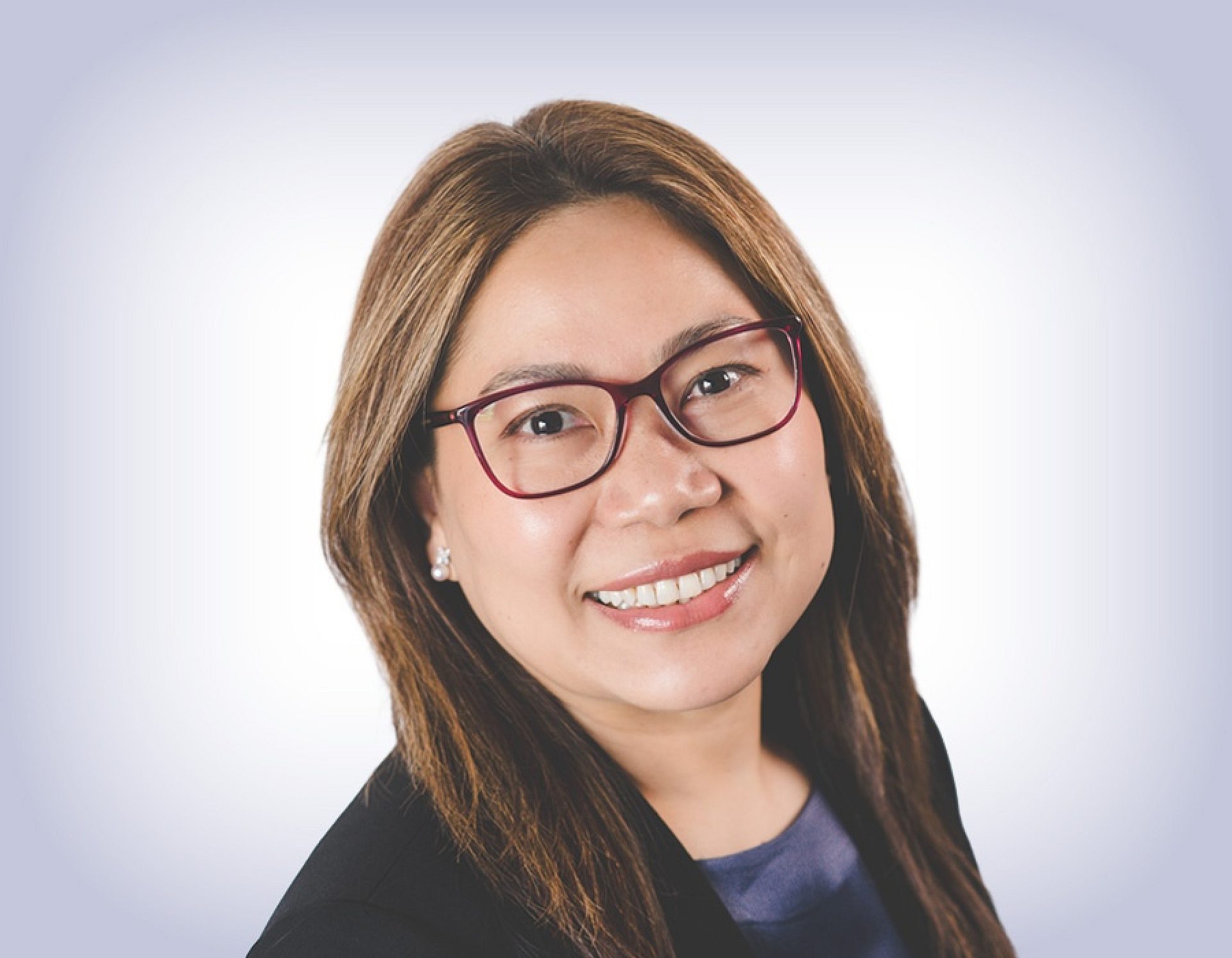 Headshot of amita maibam on white background