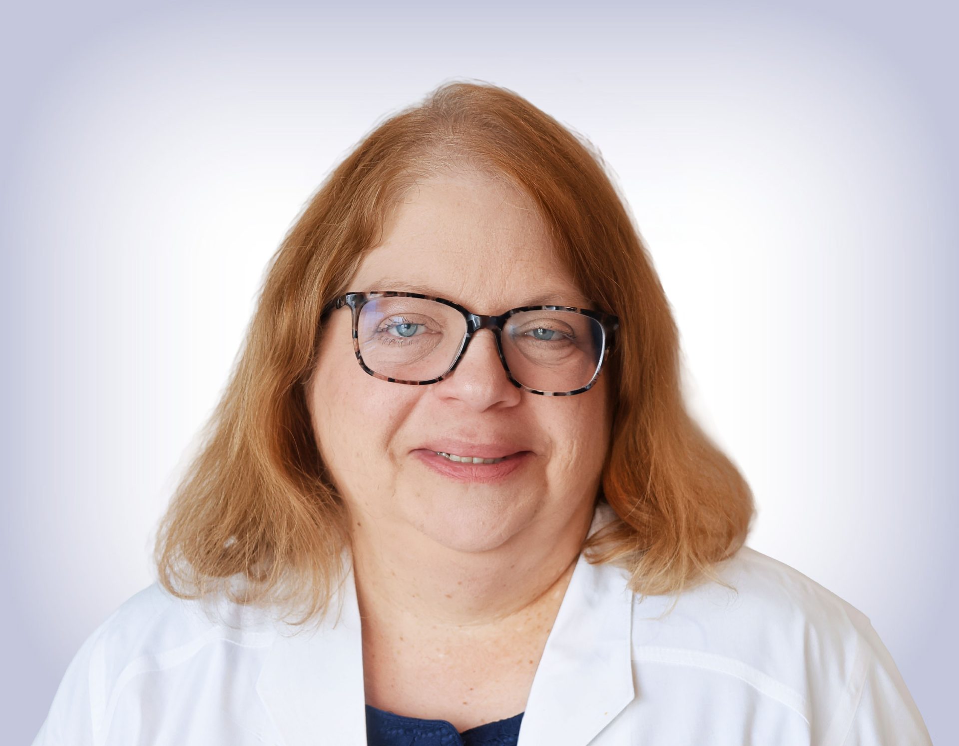 Headshot of kathy thomas on white background