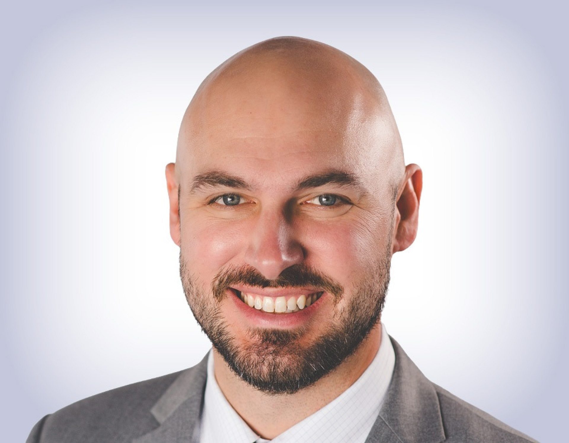 Headshot of william elliot on white background